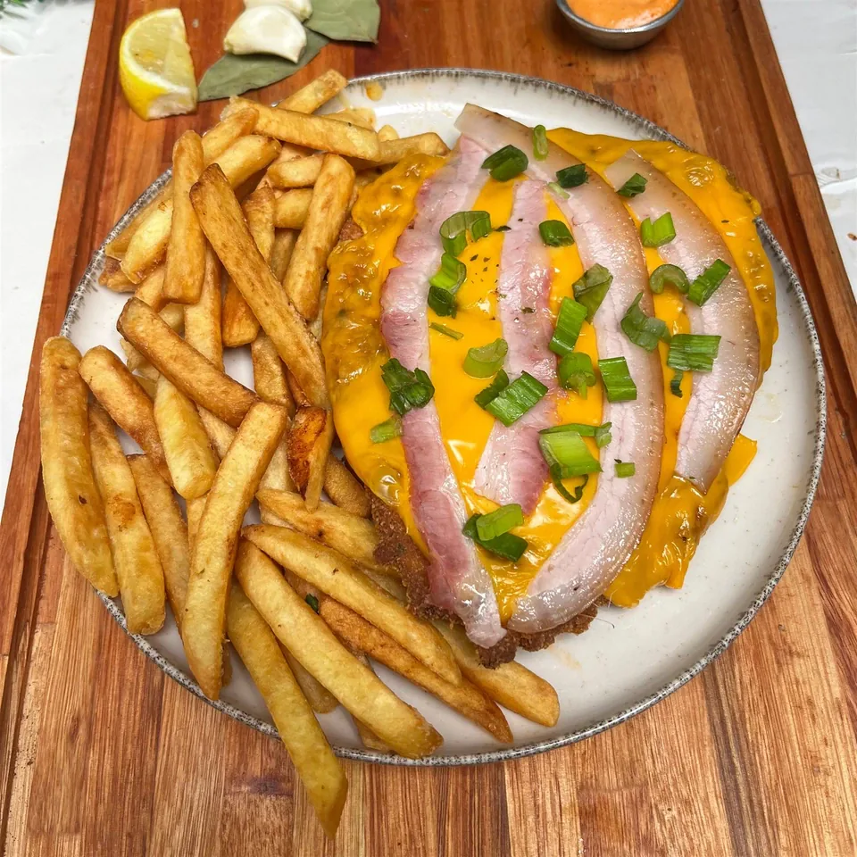 Milanesa Panceta y cheddar de El Brasero